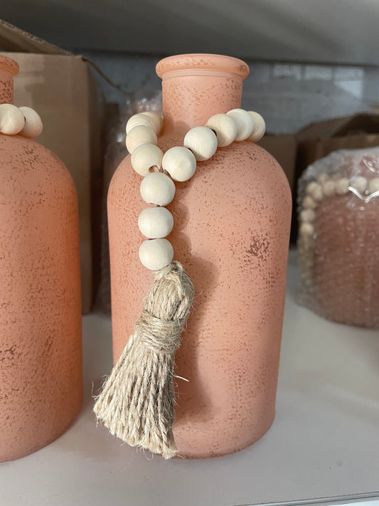 Clay colored vases with bead detail